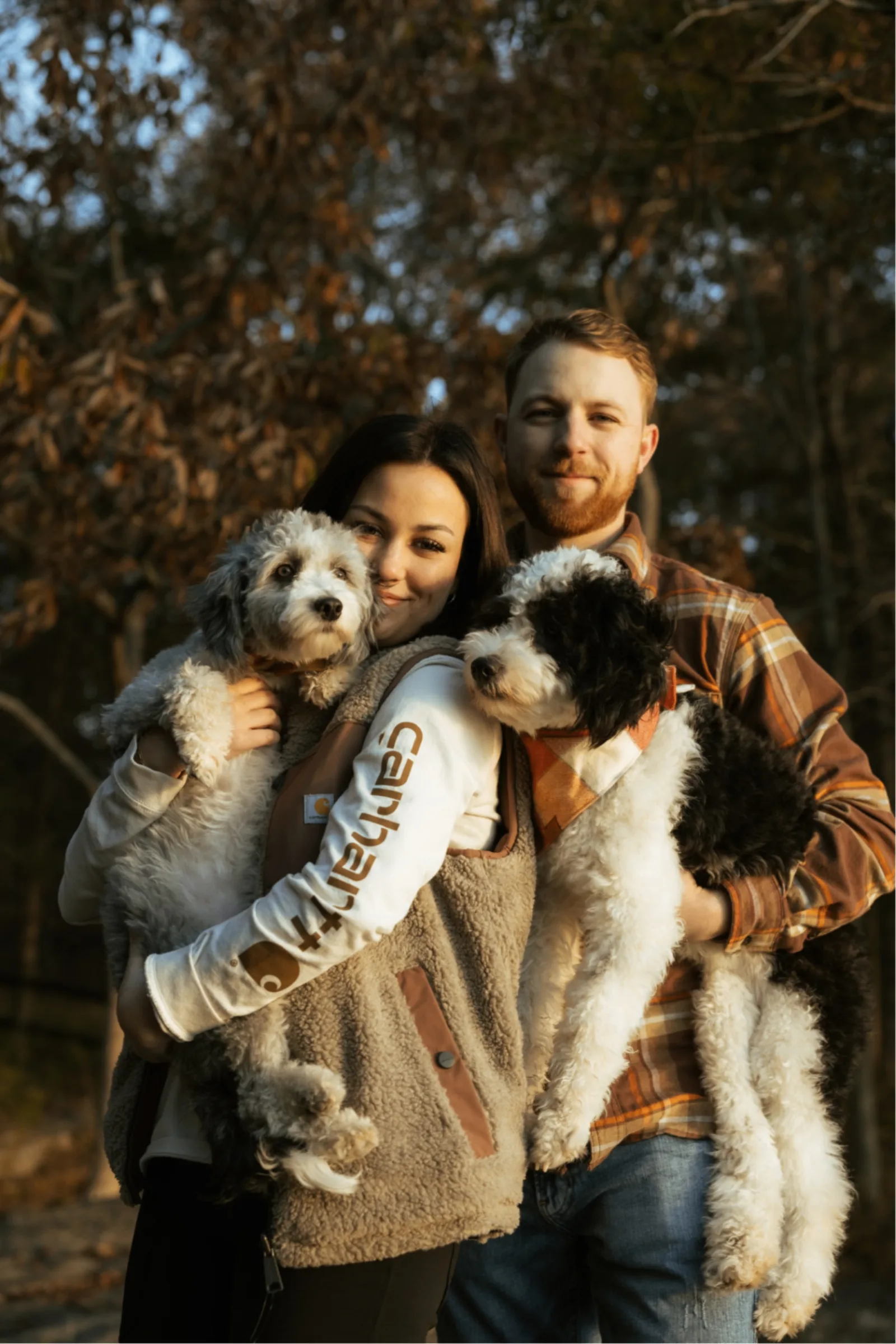 Jared McMurdie with his wife and their two dogs