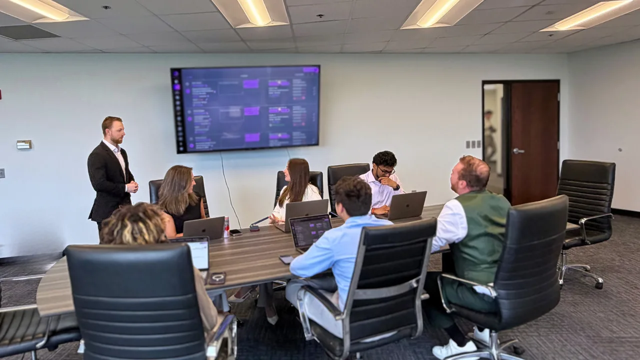 The McMurdie Healthcare Solutions team meeting in the Nashville office