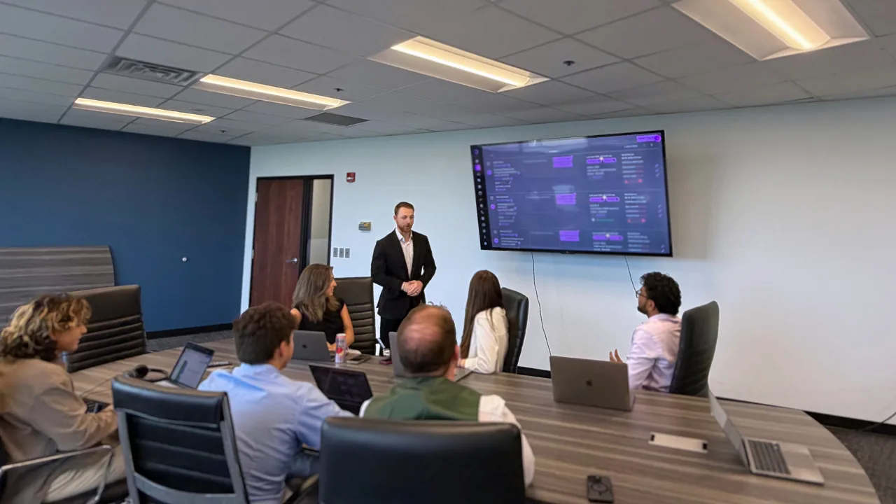 Jared coaching the Nashville advisory team in the office