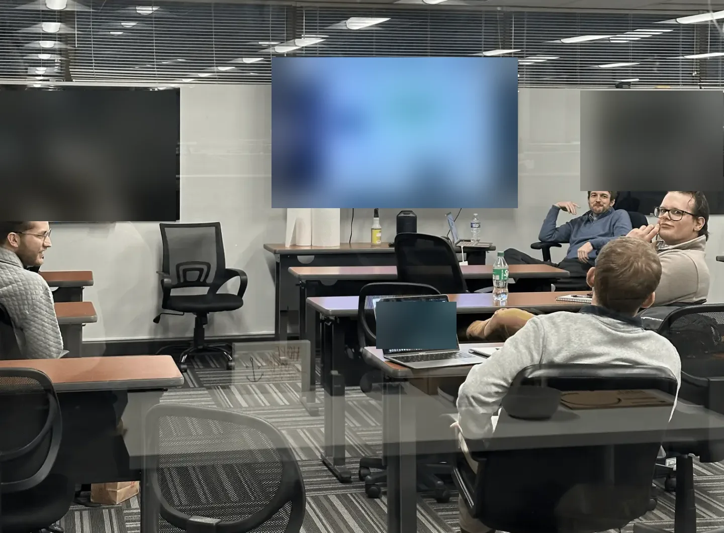 Advisors in a training session in the Nashville office